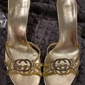 Gold Gucci interlocking GG sandals
